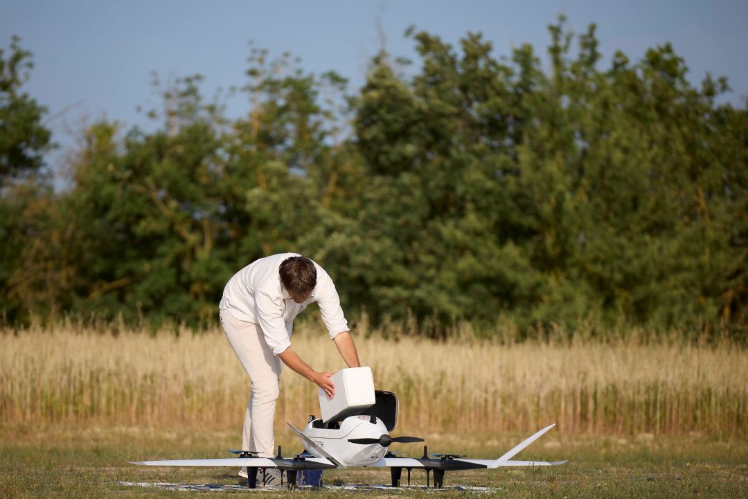 BCN Drone Center pilot placing cargo on a delivery drone